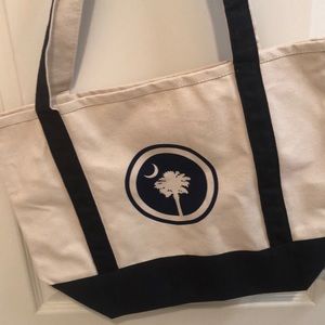 Tote bag 13” height, 17” width, 5” depth.